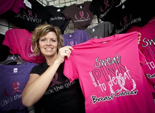 Tricia Roberts of Dunlap underwent a double mastectomy after breast tissue biopsies revealed pre-cancerous cells. Roberts is asking RAGBRAI participants to wear pink July 22, the second day of cycling on the annual ride. (Rodney White/The Register) 