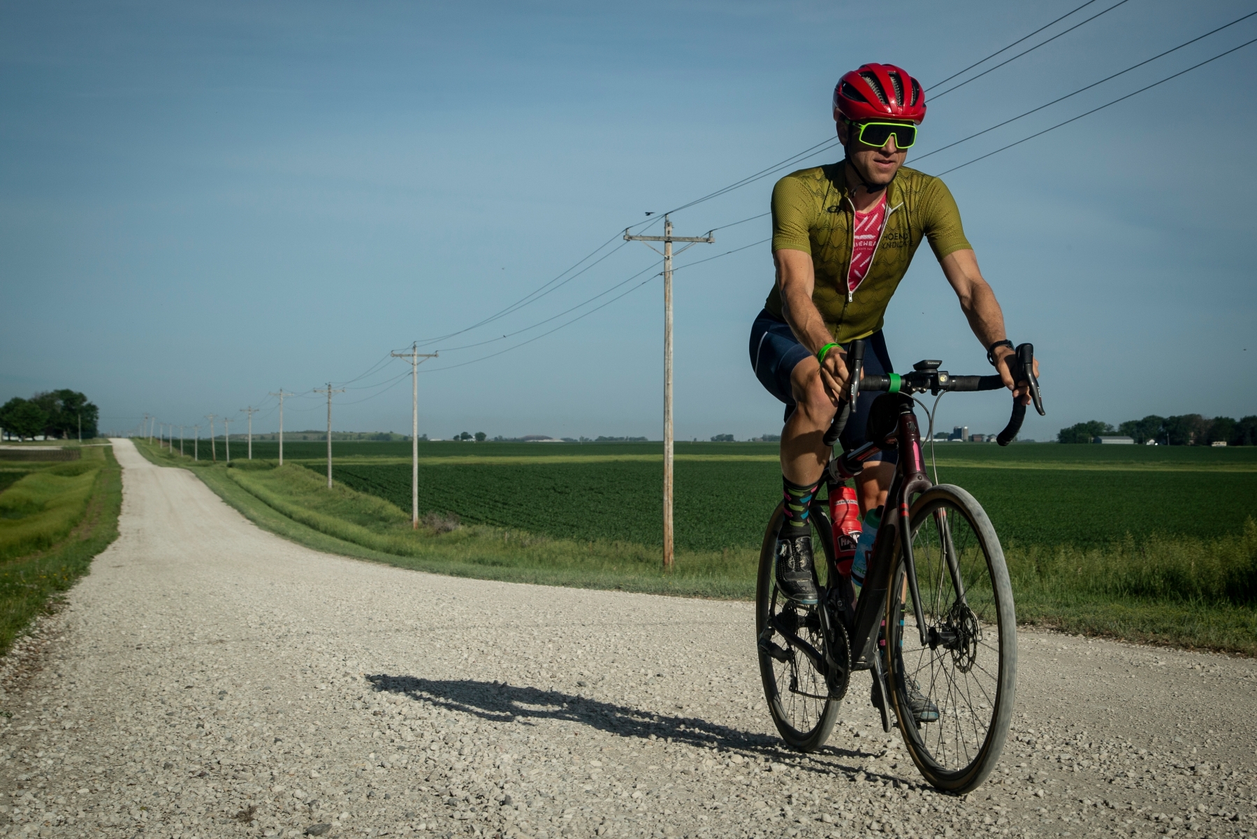 Cyclists, including Scott Olsen ride the optional gravel route from Fort Dodge to Webster City during the RAGBRAI route inspection ride on Tuesday, June 8, 2021.