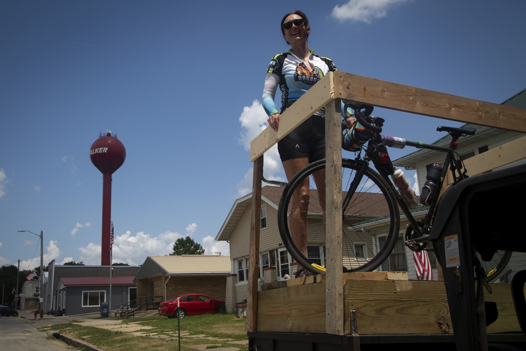 RAGBRAI's Andrea Parrott takes a ride in an ATV lift in Walker during the RAGBRAI route inspection ride on Thursday, June 10, 2021. Day 5 of the route brings riders from Waterloo through the meeting town of Center Point to Anamosa. Riders also have the option of doing the Karras loop, bring the days total mileage to about 110.