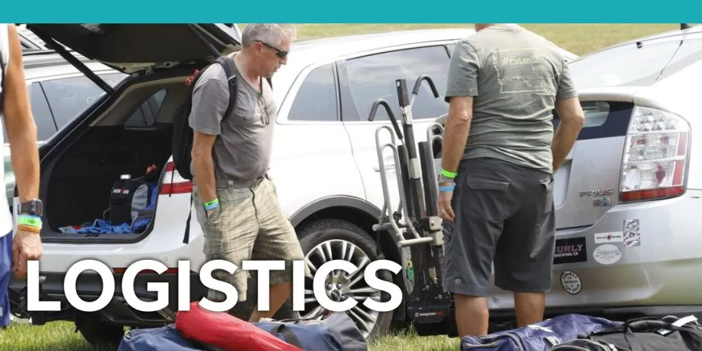 Logistics header - men with cars and equipment